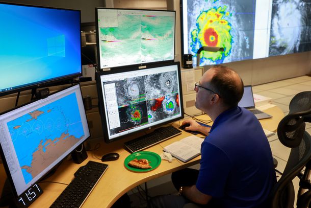 Brad Reinhart, Senior Hurricane Specialist at the National Hurricane Center, works on tracking Hurricane Beryl, the first hurricane of the 2024 season, at the National Hurricane Center on July 01, 2024 in Miami, Florida.